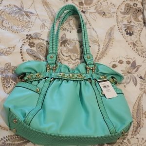 Aquamarine bag. Comes with shoulder strap.
